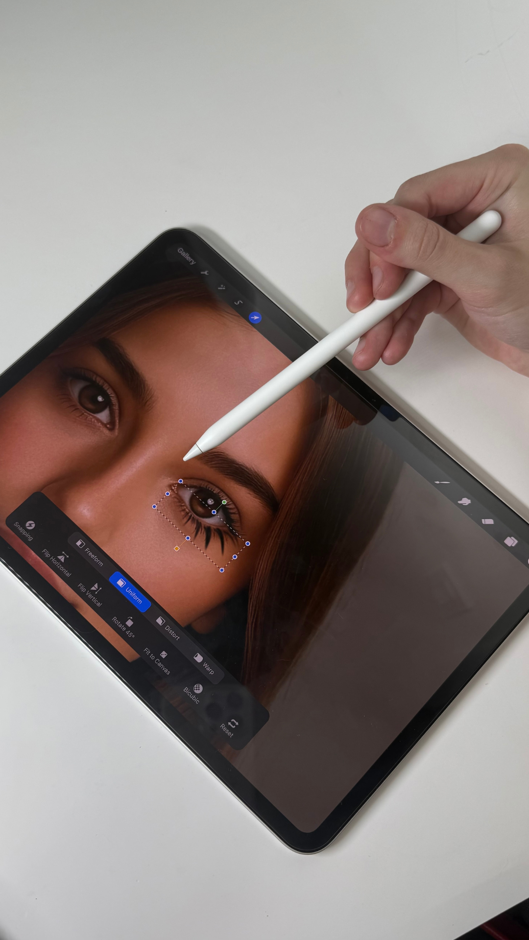 Lash mapping demonstration on a tablet using a stylus to plan lash placement on a client image