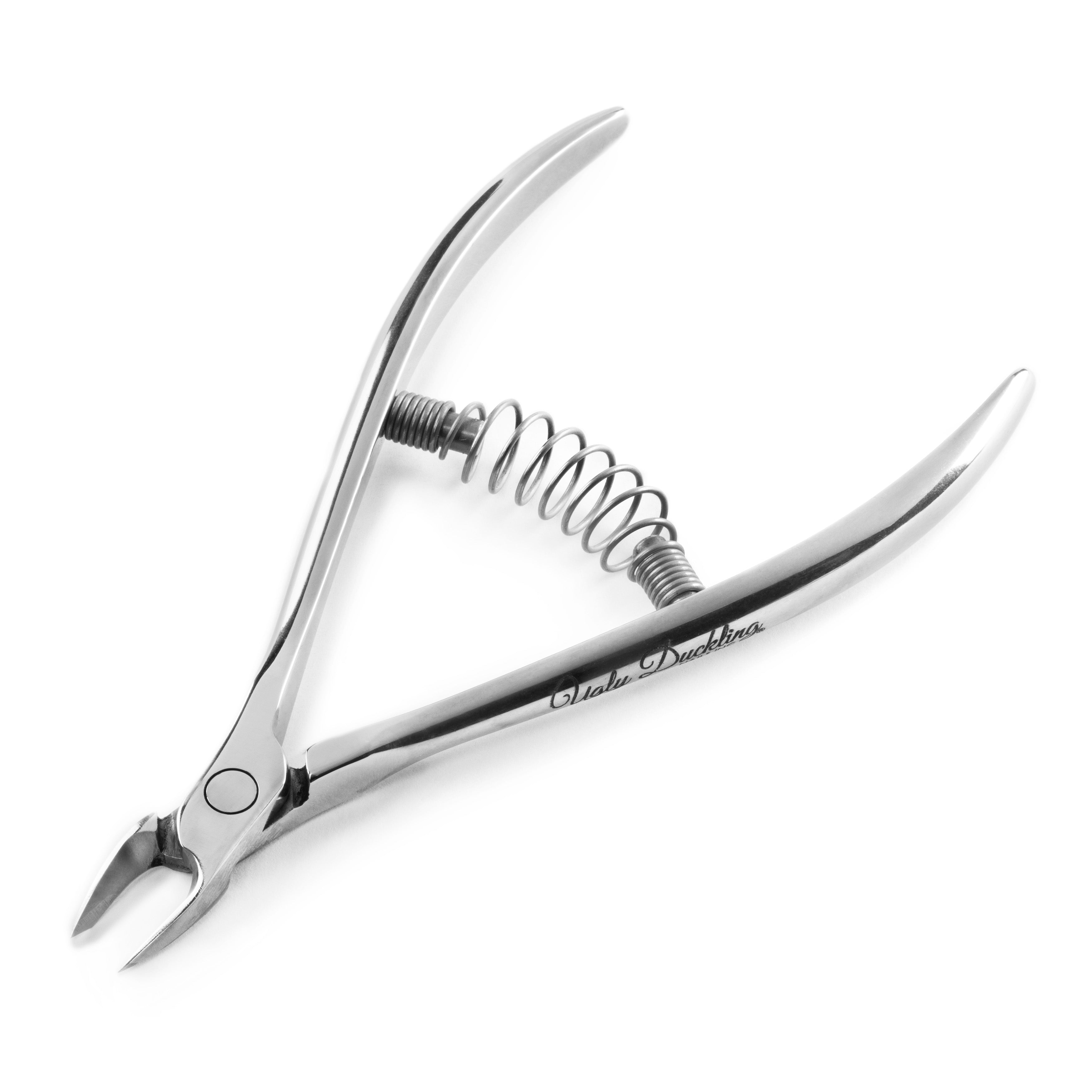 Metal nail clipper with spring mechanism on a white background