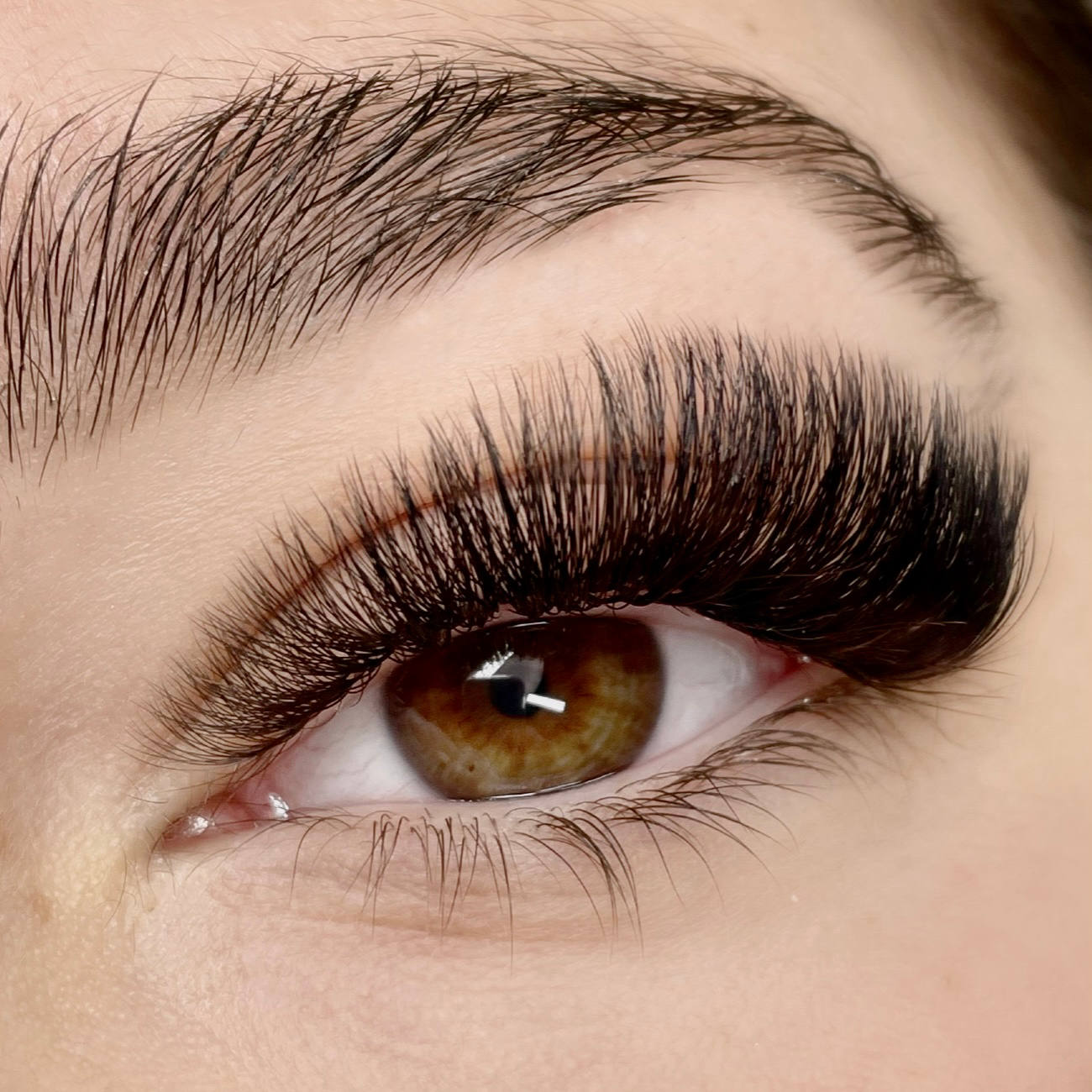 mega volume lash extensions applied to a model