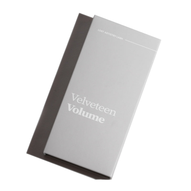 Two books titled 'Velveteen Volume' on a white background