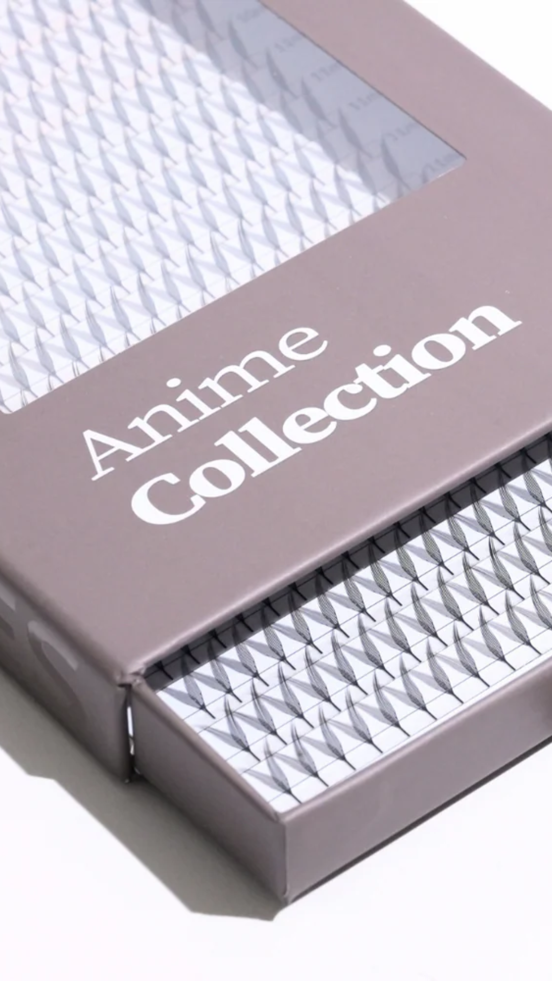 Lash tray from the Anime Collection in a mauve box with a clear window showing the lashes inside.