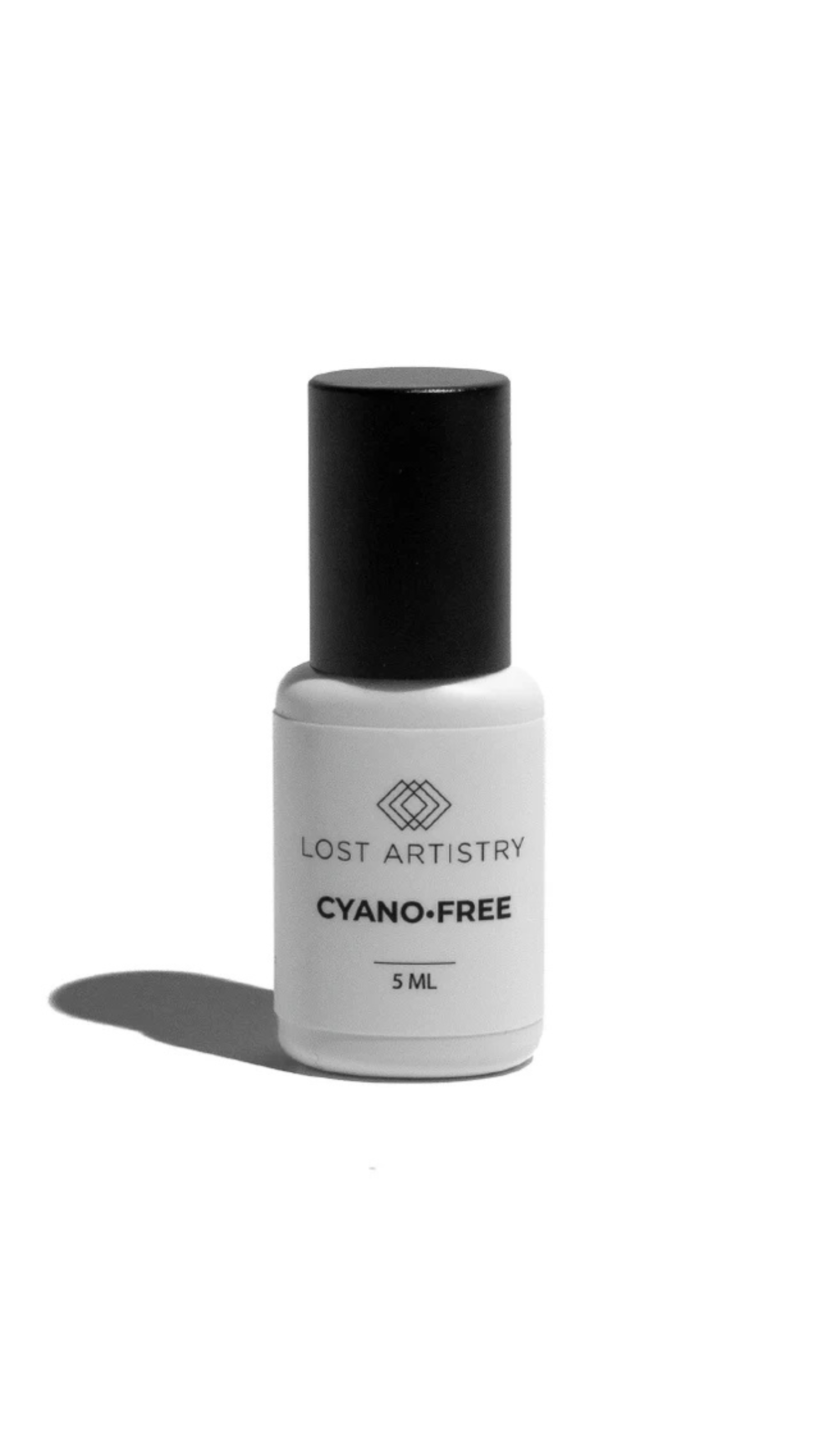 Lost Artistry Cyano-Free lash adhesive 5ml bottle, safe eyelash extension glue for sensitive clients.