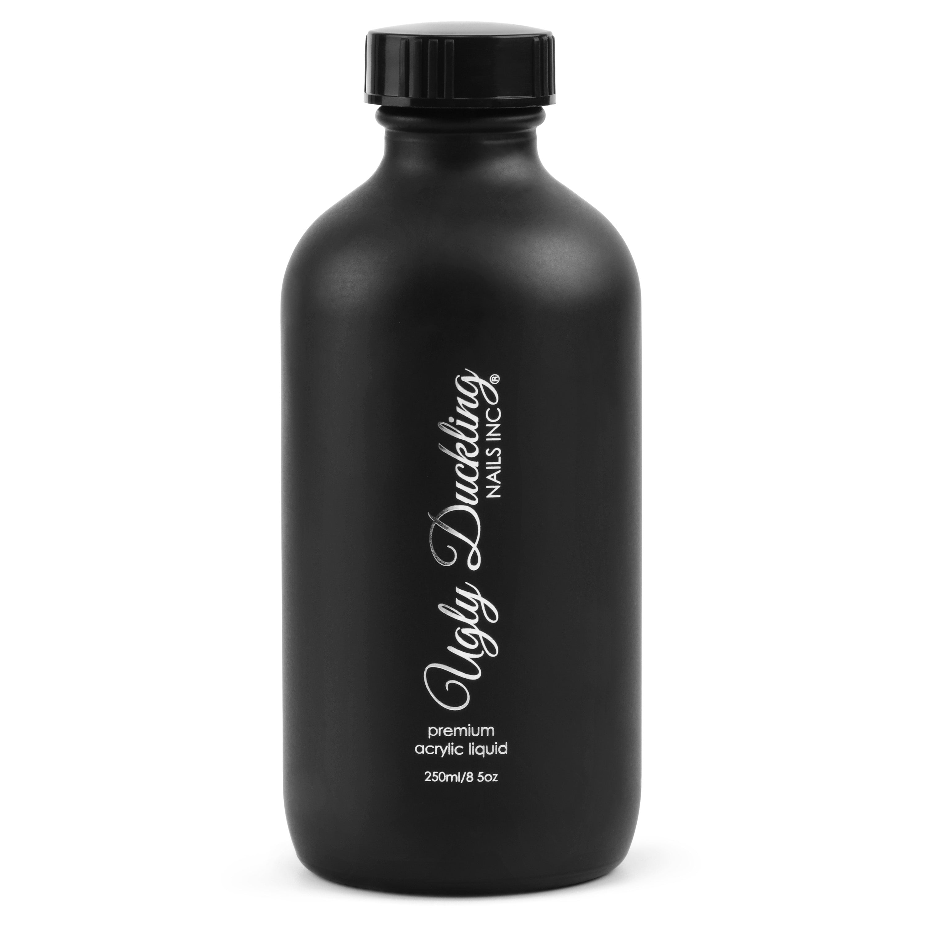 premium acrylic liquid for nail services by ugly duckling in a black bottle
