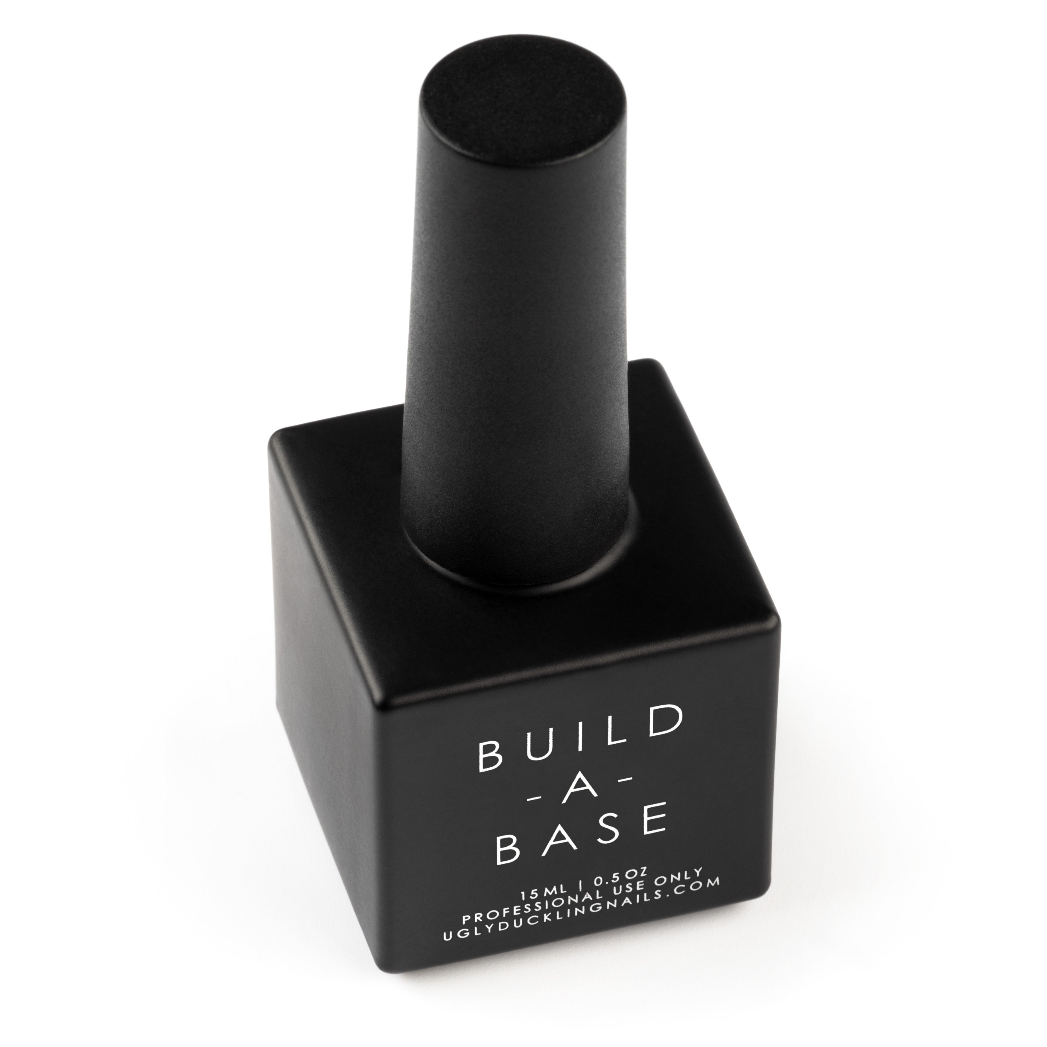 Black nail polish bottle with 'Build a Base' text on a white background
