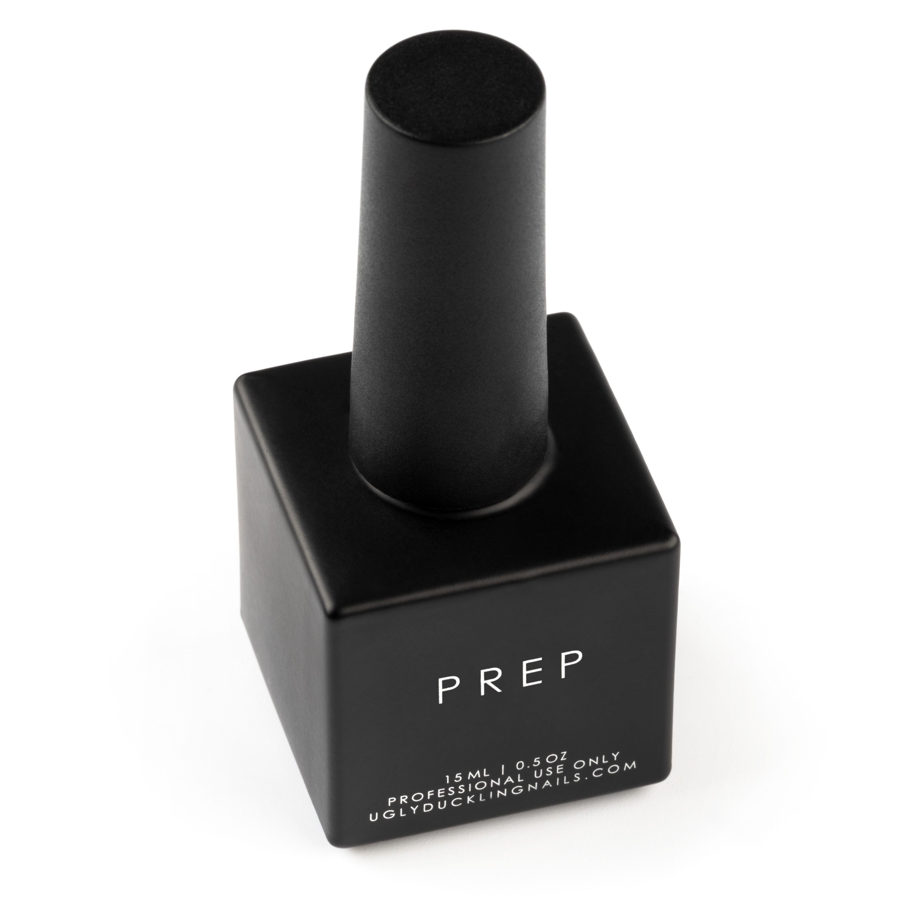 Black nail polish bottle with 'PREP' branding on a white background