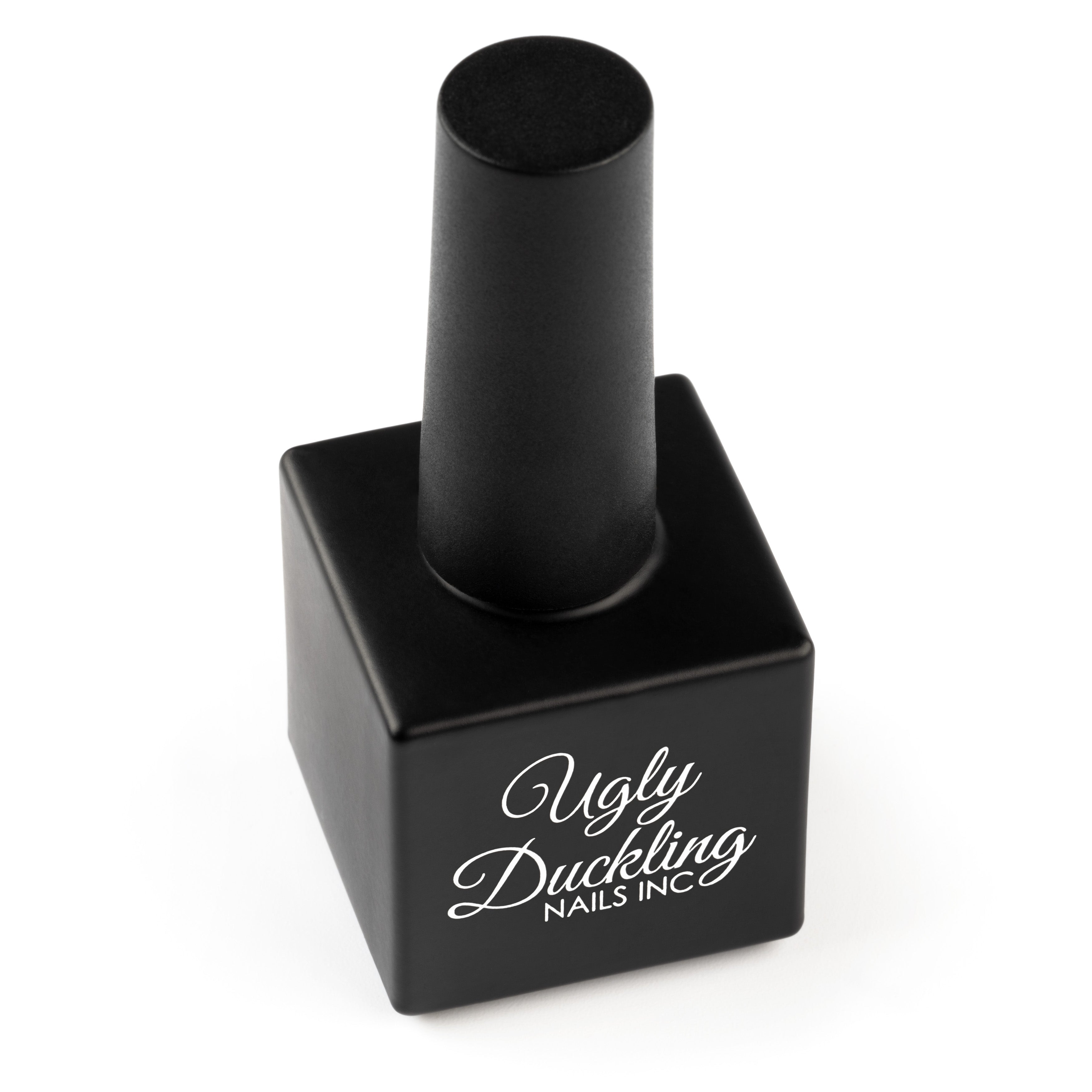 matte nail product in nail polish bottle