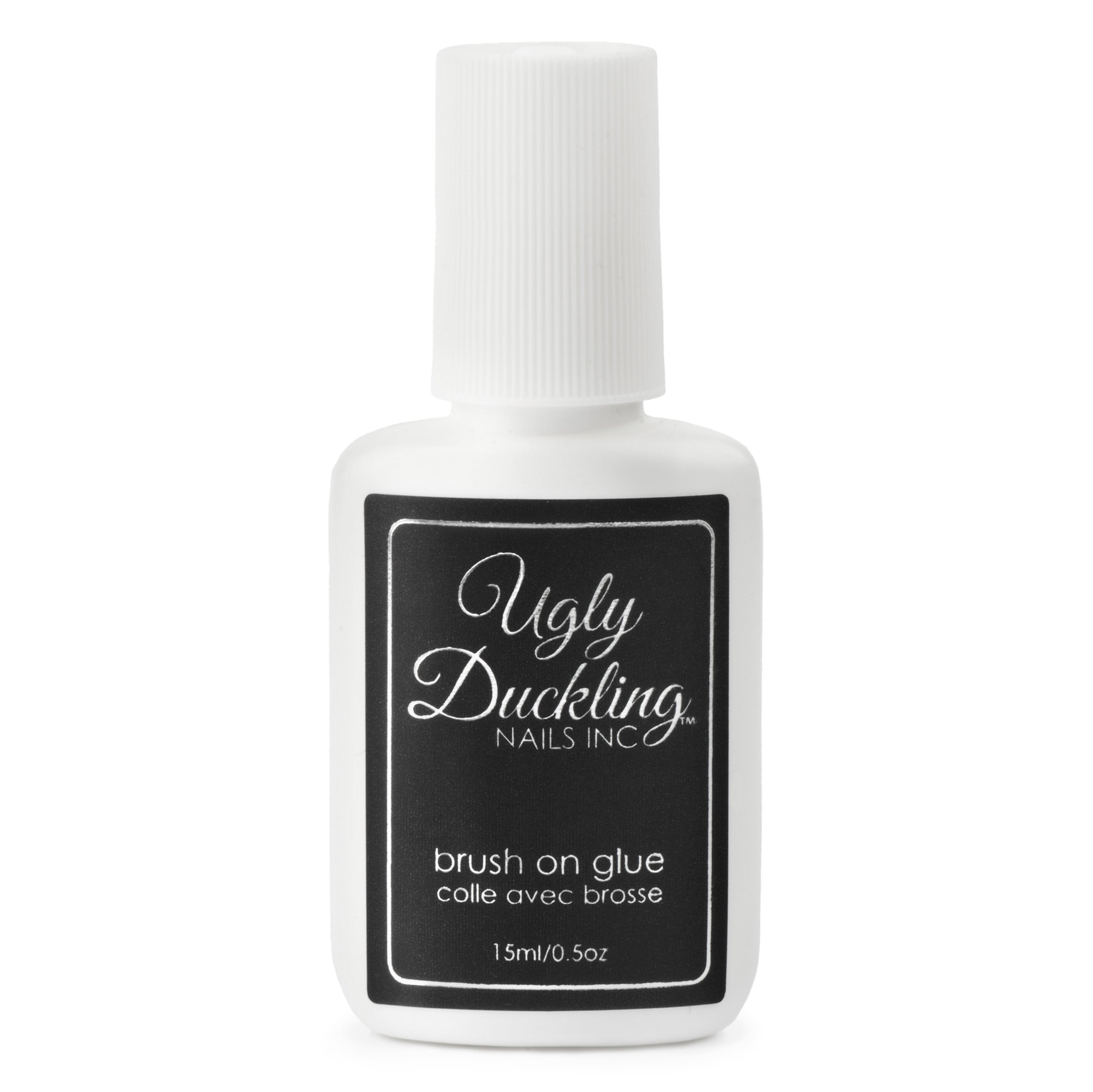 Ugly Duckling Nails Inc. brush on glue bottle on a white background