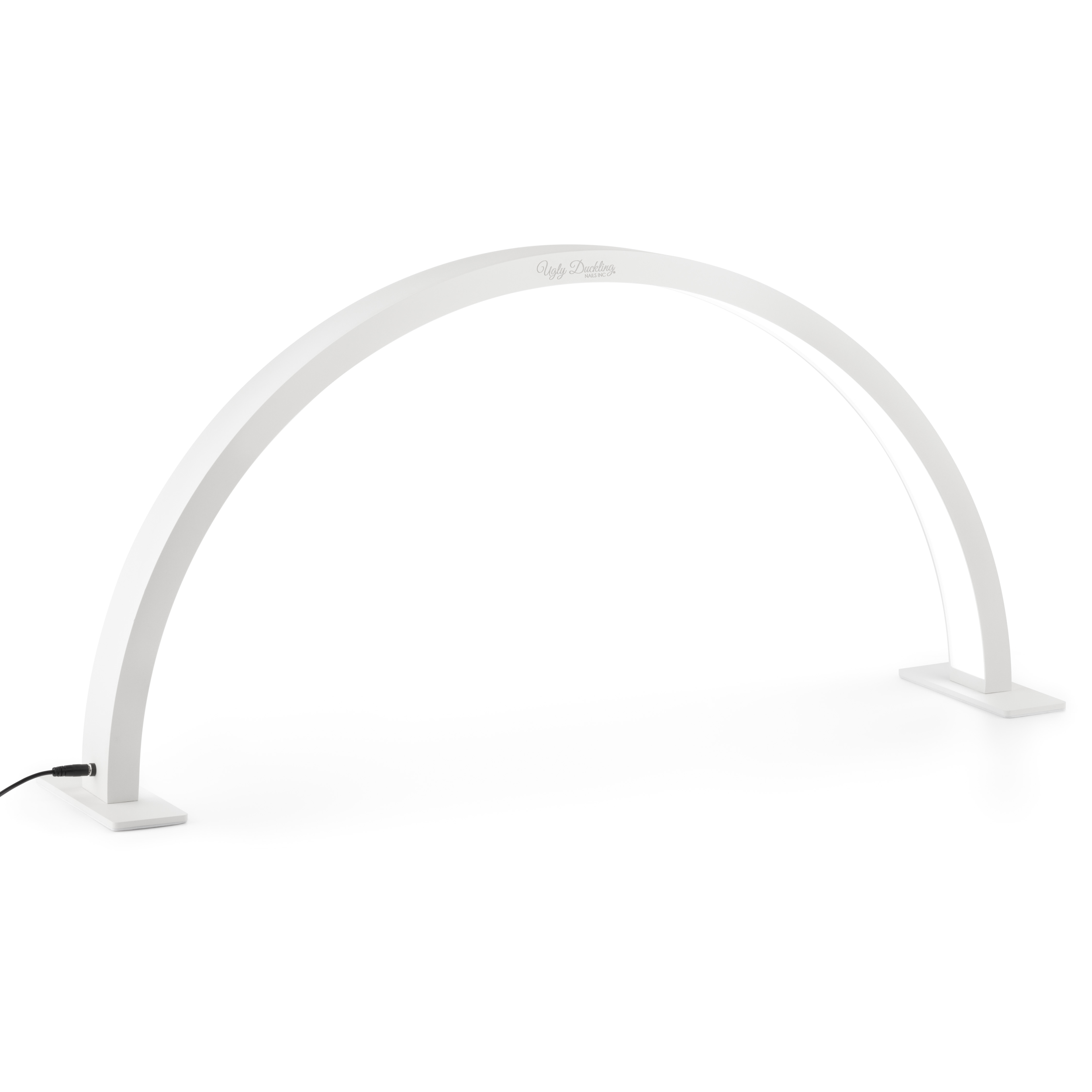 White arch-shaped lamp on a white background