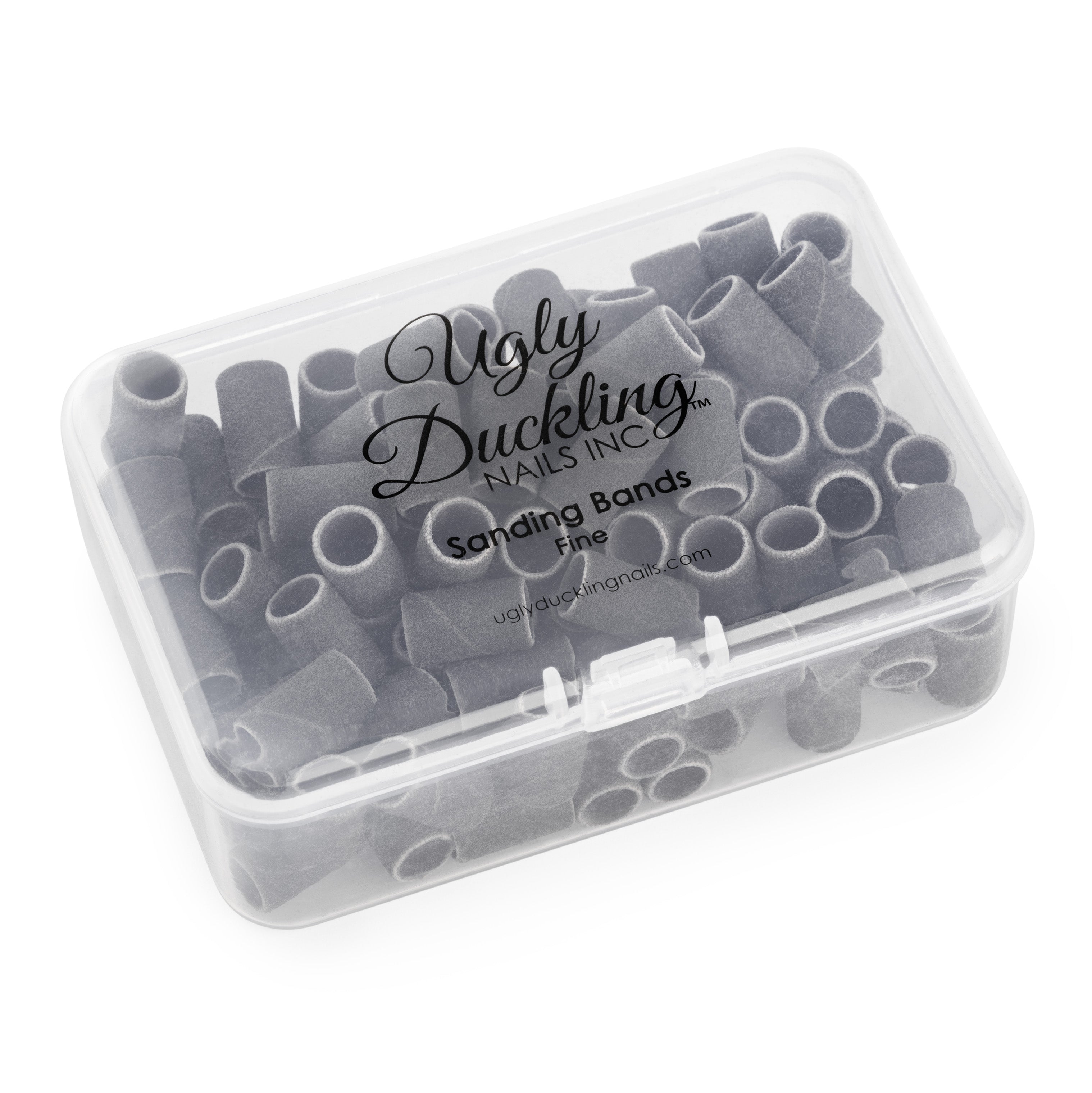 Clear container with gray sanding bands labeled 'Ugly Duckling Nails Inc'.