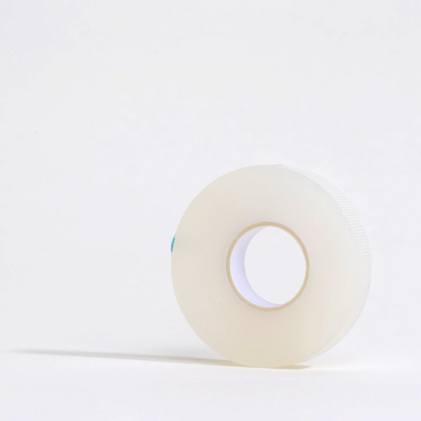 Clear tape roll on a white background